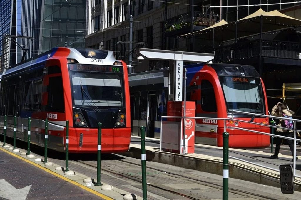 How Will Technology Impact the Future of Public Transportation? 1 red trains at a stop